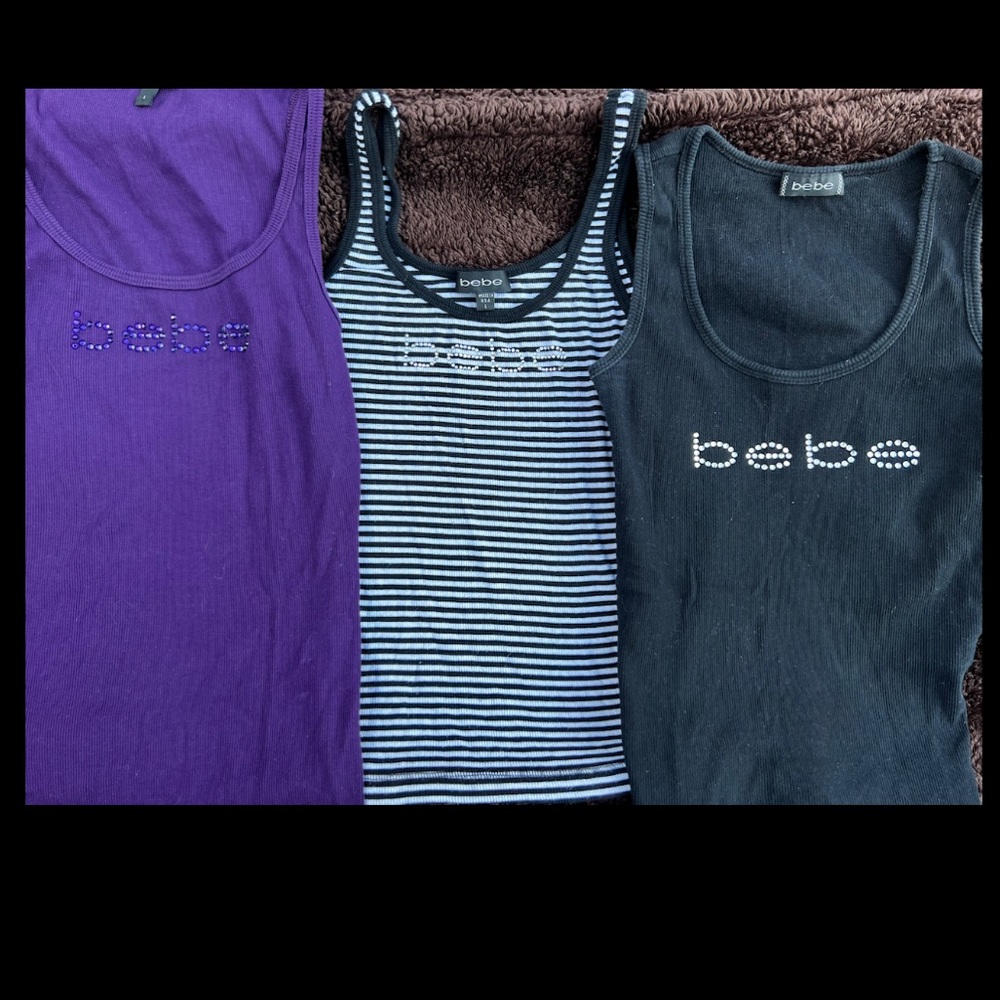 Three, size large Bebe rhinestone tank tops